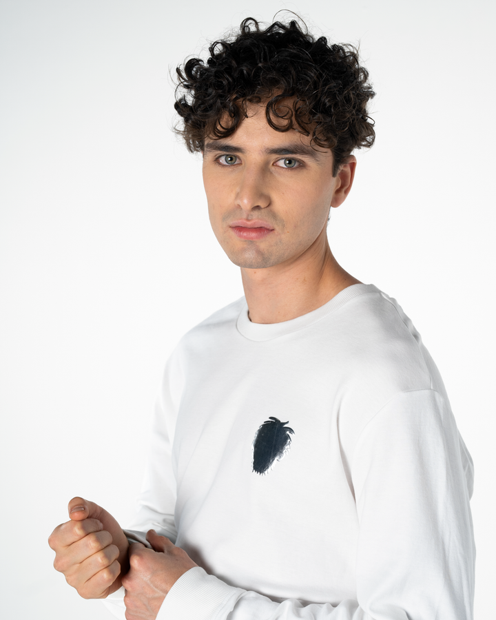 Man wearing a white sweatshirt with a silver foil logo design on a white background #color_white