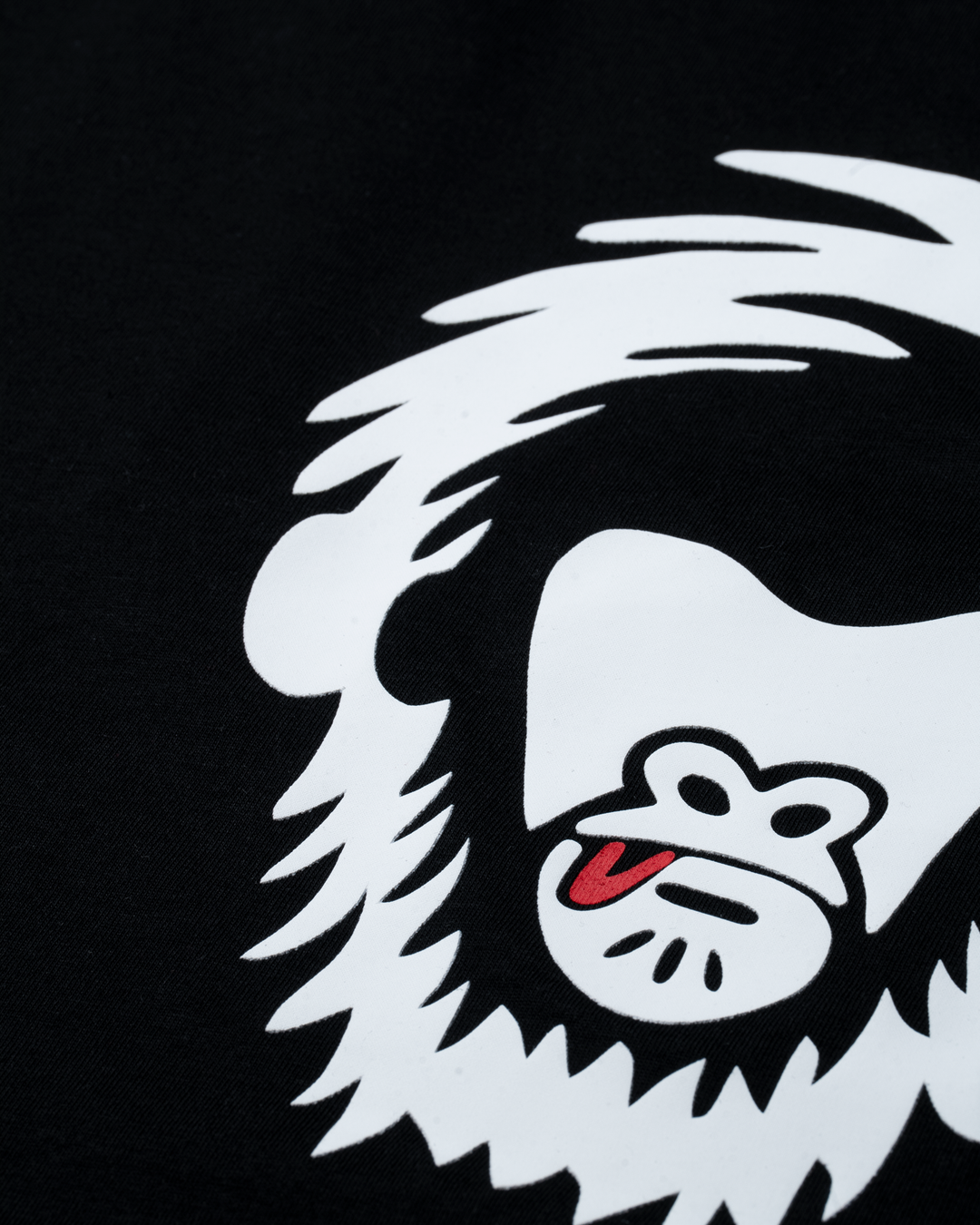 White cartoon character with a red tongue on a black background #color_black