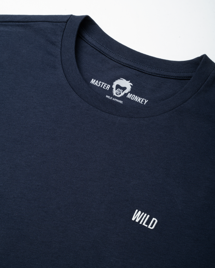 Navy blue t-shirt with 'Master Monkey' logo and 'WILD' text on a white background #color_midnight