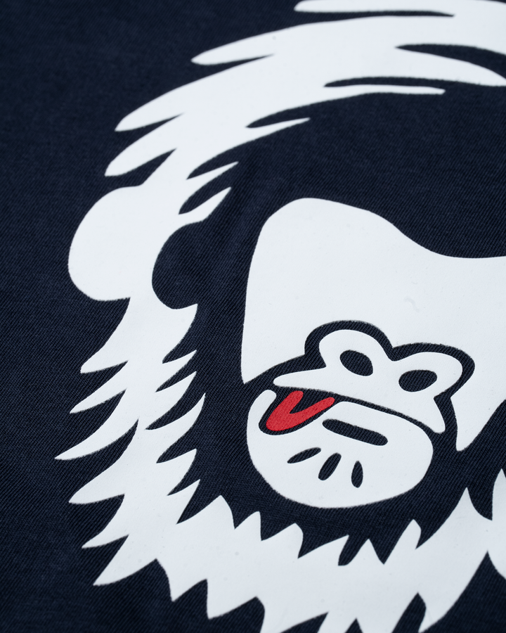 White monkey ogo with red tongue on navy background #color_midnight