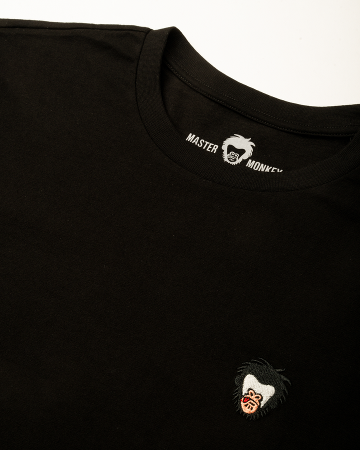 Black t-shirt with the Master Monkey logo on the chest and brand name on the collar #color_black