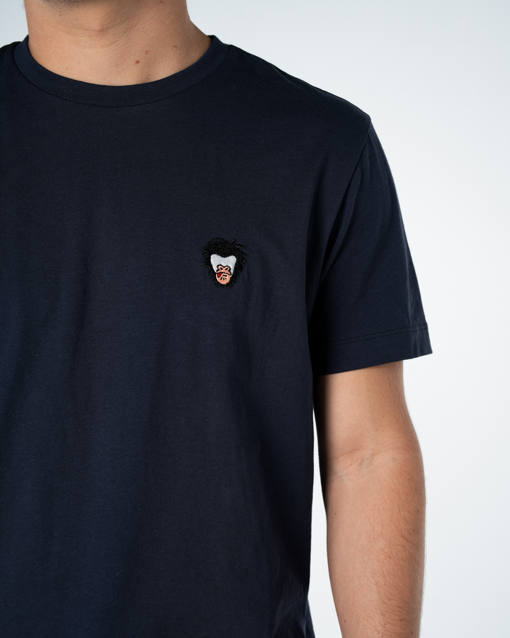 Black t-shirt with a small embroidered Master Monkey design on a white background #color_midnight