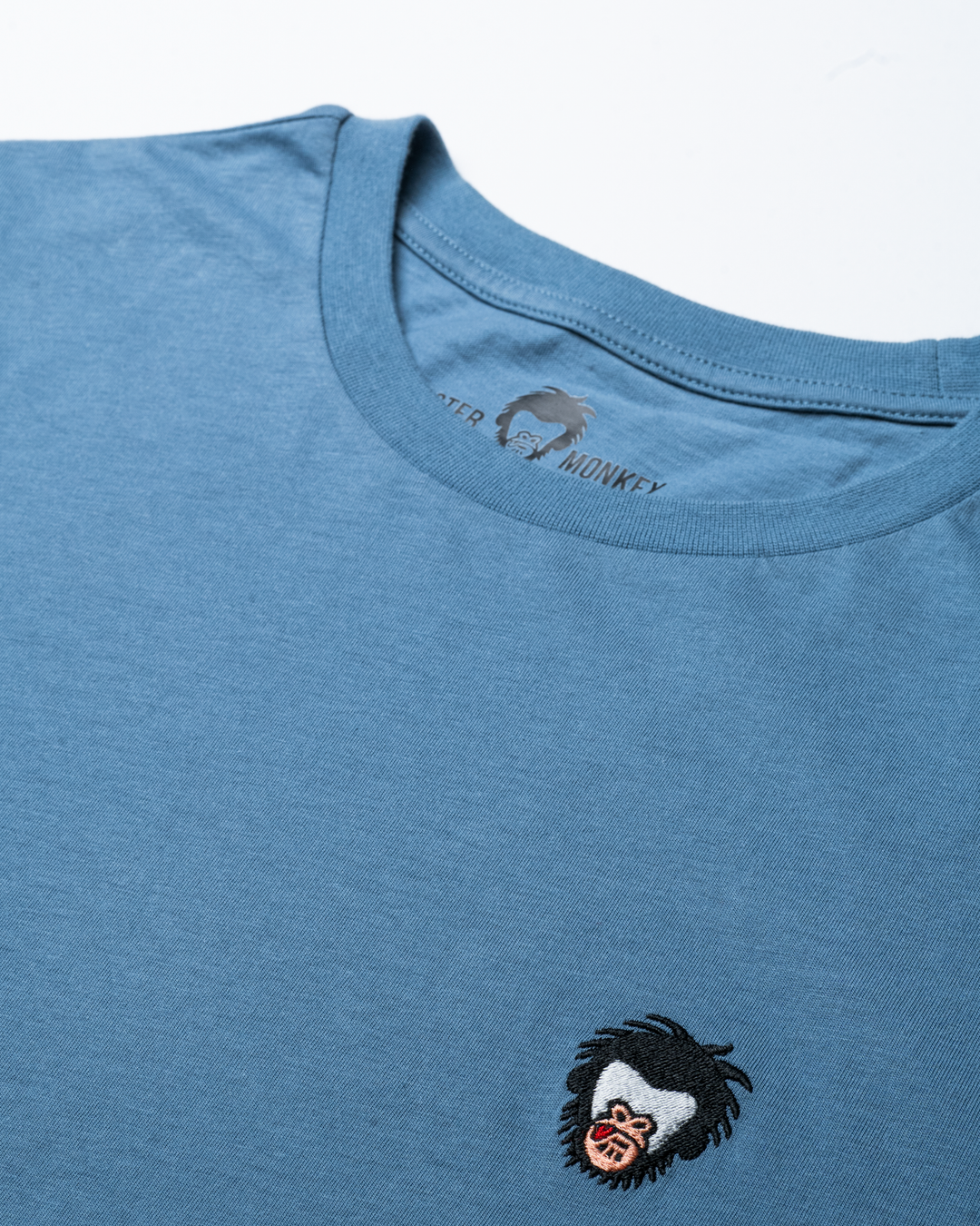 Blue t-shirt with Master Monkey logo on a white background #color_steel-blue