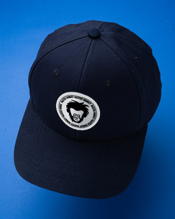 Navy cap with a logo on a blue background #color_midnight